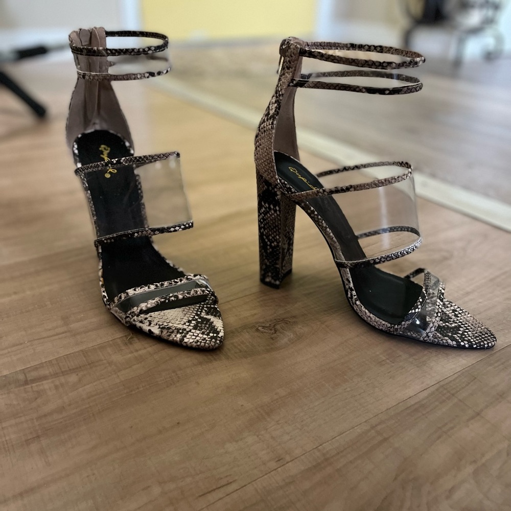 Snakeskin and clear heels